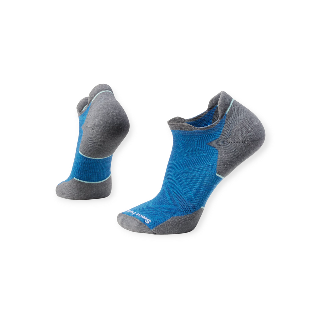 Blue and gray running socks by Smartwool, featuring geometric design and low ankle style.