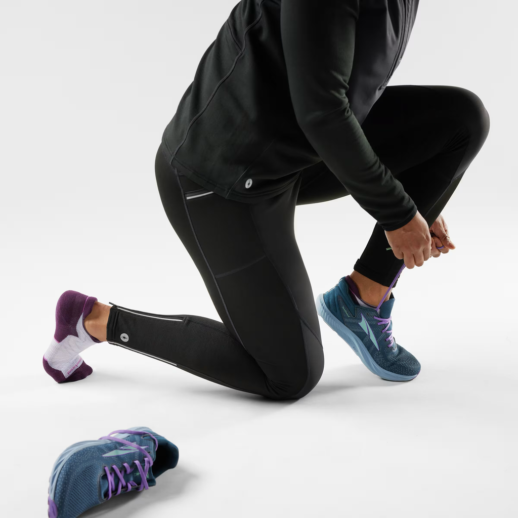 Low ankle socks by Smartwool, with a cushioned sole and purple detailing.