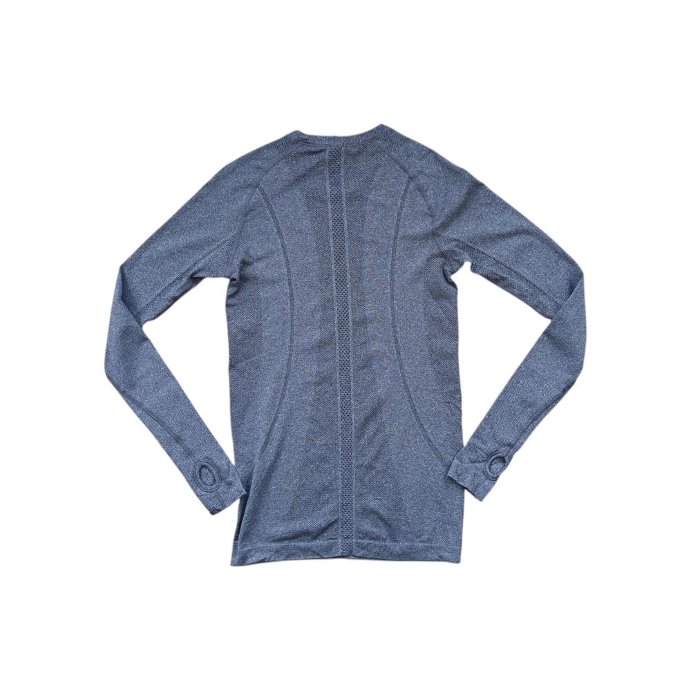 Grey long sleeve crew shirt by Lululemon, with knit detailing down the back and thumb holes at the wrist.
