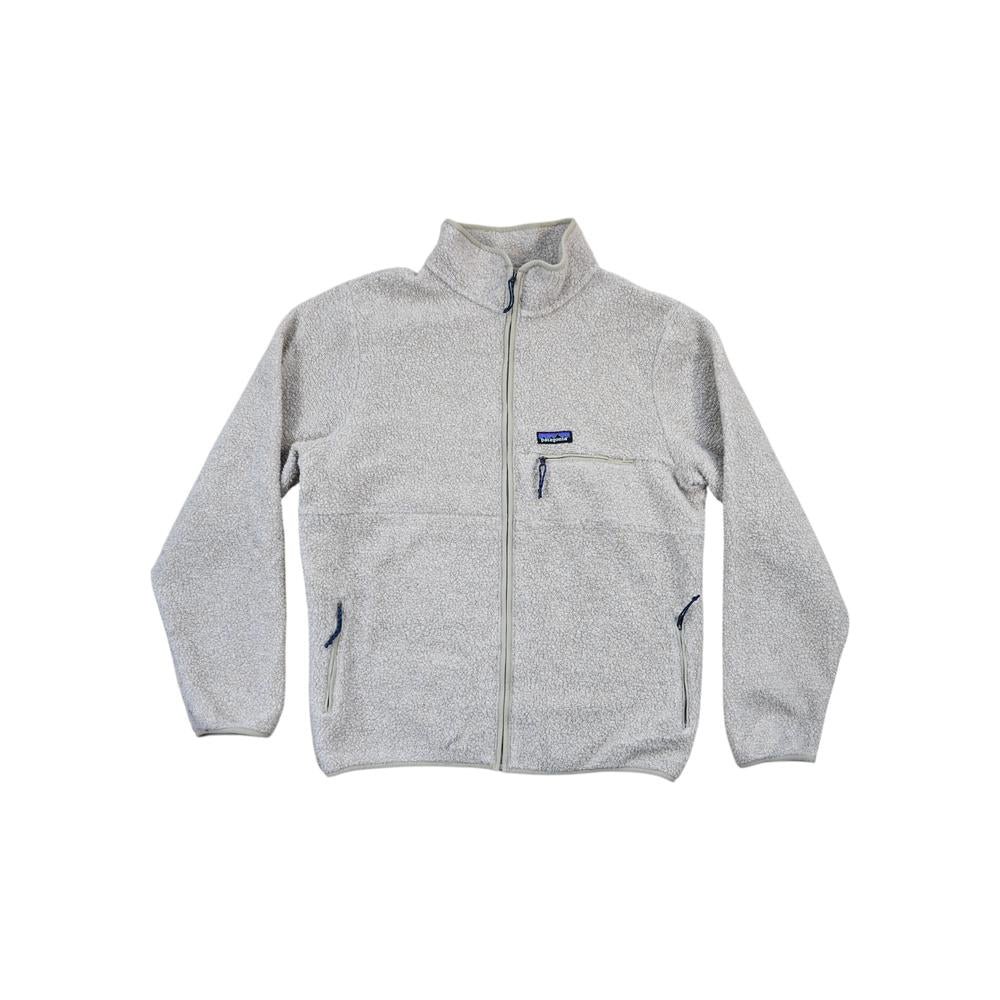 Tan fleece jacket by Patagonia with a full zipper, zippered pockets, and soft texture.