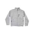 Tan fleece jacket by Patagonia with a full zipper, zippered pockets, and soft texture.