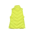 Yellow sleeveless puffer vest by Athleta, featuring a quilted chevron pattern and stand collar.