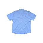 Light blue short sleeve shirt by Howler Bros featuring a western yoke and snap closures, back view.
