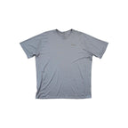 Gray active shirt by Patagonia with short sleeves and subtle vertical striped pattern.
