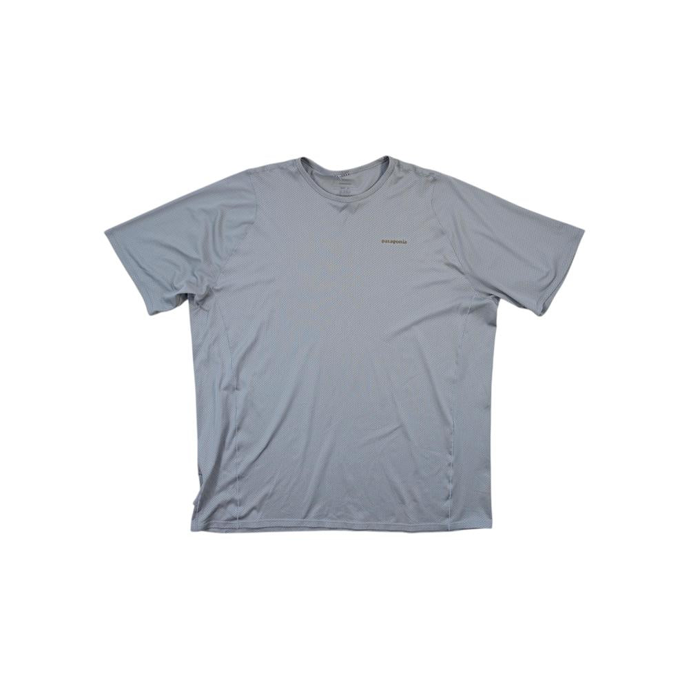 Gray active shirt by Patagonia with short sleeves and subtle vertical striped pattern.