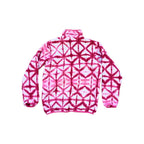 Pink fleece pullover by Patagonia with an all-over diamond tie-dye pattern.