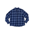Blue plaid flannel long sleeve shirt by Woolrich featuring a heavyweight weave and button-down front.