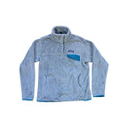 Grey fleece pullover by Patagonia with a front pocket and teal accents.