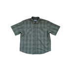 Green plaid short-sleeve shirt by Orvis, featuring button-down front and chest pockets.