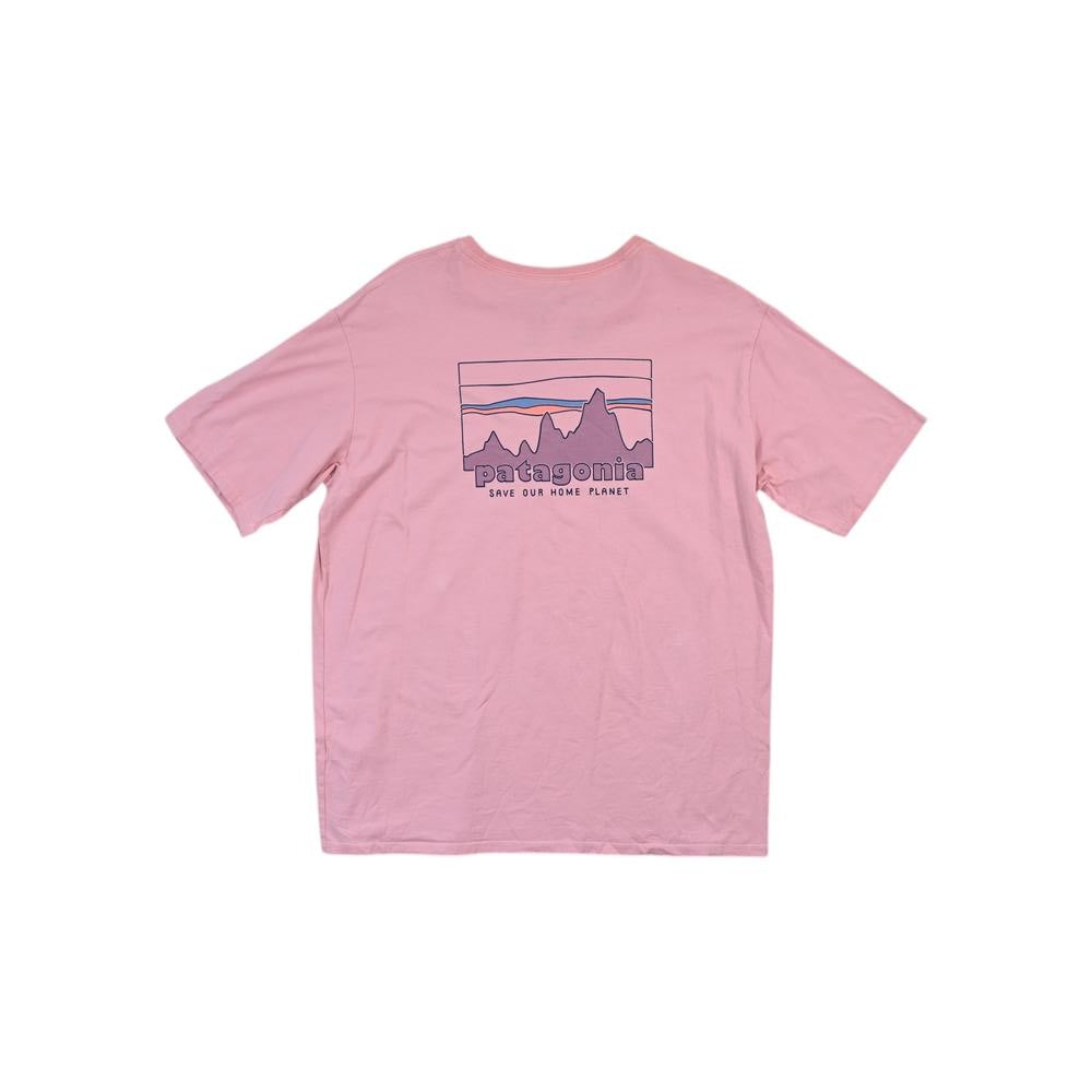 Pink organic cotton t-shirt by Patagonia with a mountain graphic and brand name across the chest.