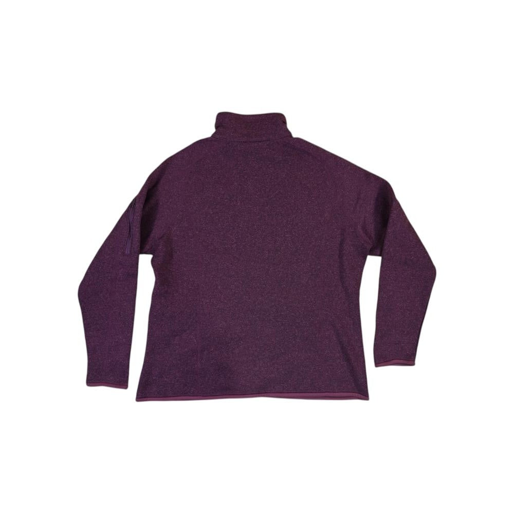 Purple fleece jacket by Patagonia with long sleeves and a high collar.