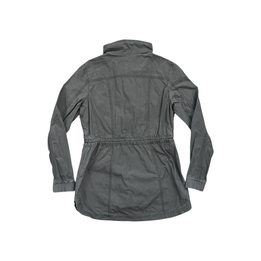 Green trench jacket by Kuhl featuring long sleeves, front button closure, and cinch waist.