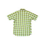 Yellow and green plaid short sleeve button-up shirt by REI with snap closures, seen from the back.
