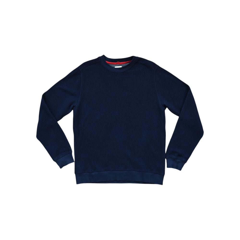 Blue wool sweater by Topo Designs with long sleeves and a ribbed hem.