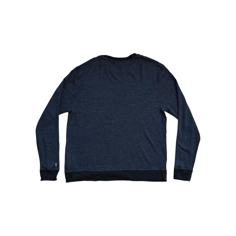 Black thermal Merino crew baselayer shirt by Smartwool, featuring long sleeves and a contrasting hem.