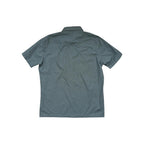Green button-down shirt by Kuhl, seen from the back with short sleeves and a classic collar.
