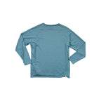 Blue long sleeve shirt by Flylow with a small logo on the lower hem.