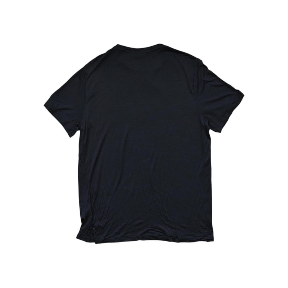 Black merino wool t-shirt by Icebreaker with short sleeves, shown from the back.