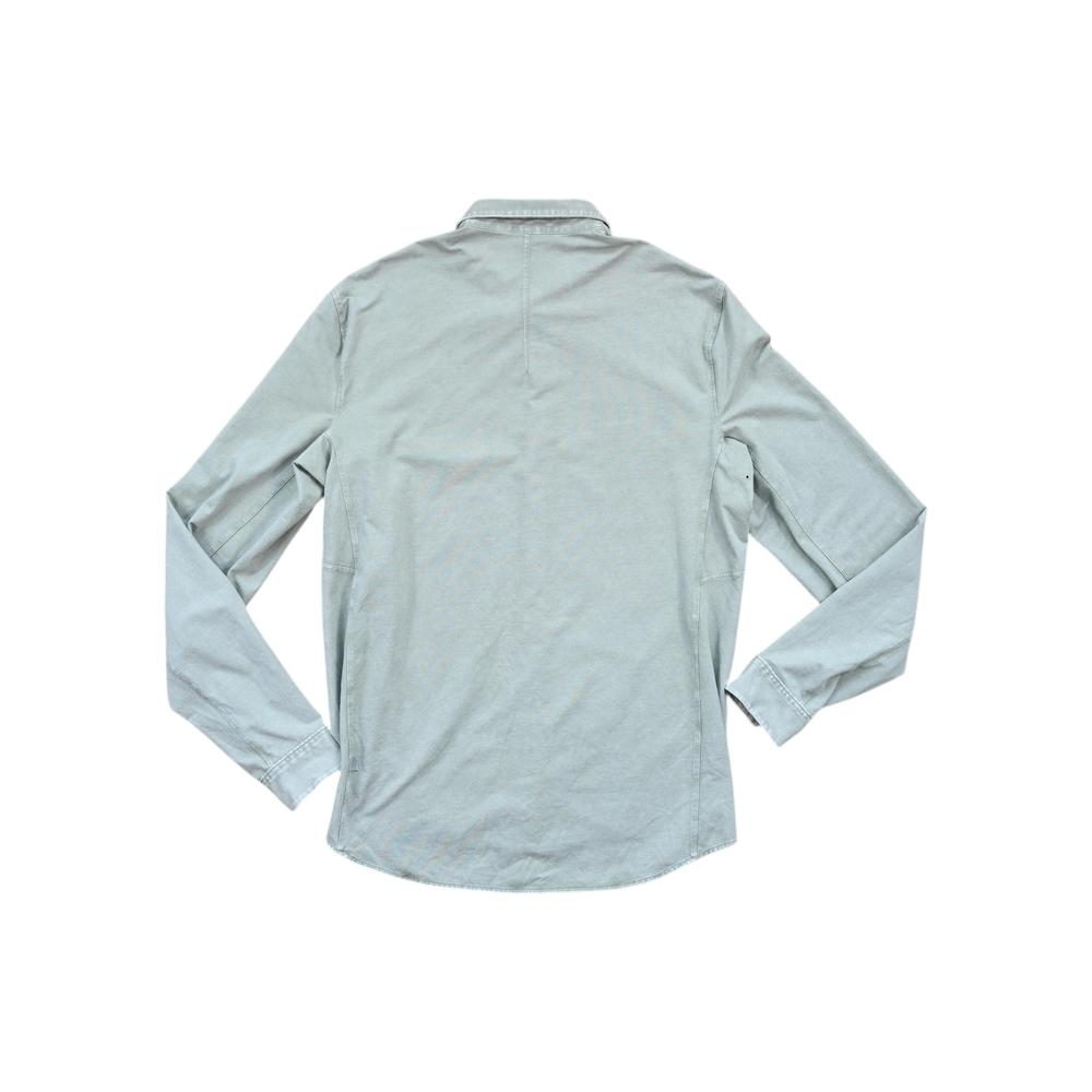 Green long sleeve shirt by Lululemon, shown in a back view.