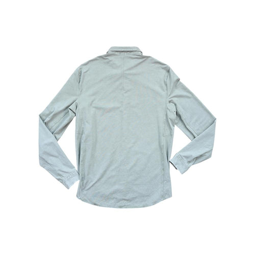 Green long sleeve shirt by Lululemon, shown in a back view.