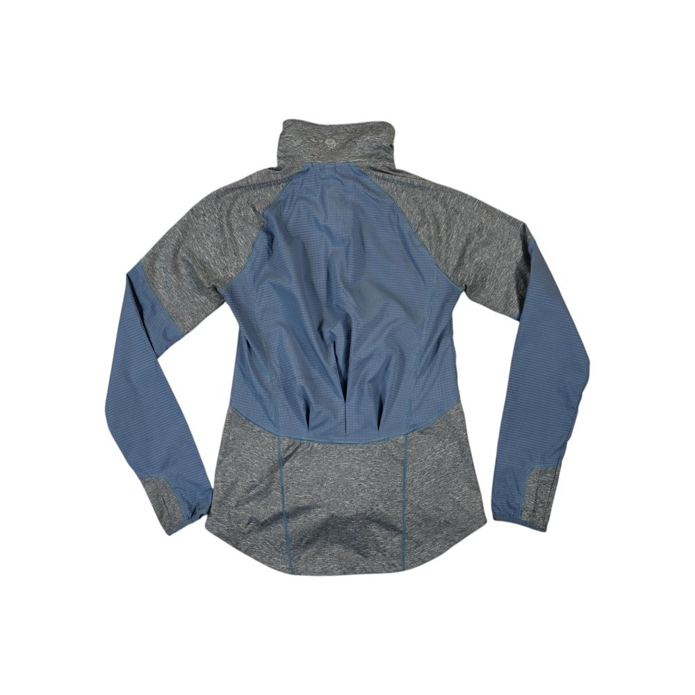 Blue softshell jacket by Mountain Hardwear with grey sleeves and a mock neck.