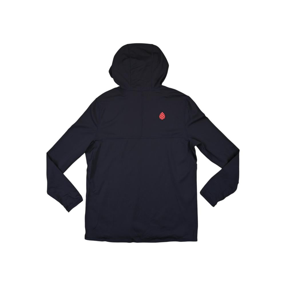 Black active hoodie by Stio, with long sleeves, a hood, and a small, red geometric logo on the upper back.