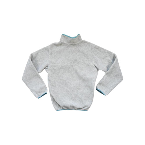 Gray fleece pullover by Patagonia with teal trim around the collar and sleeves.