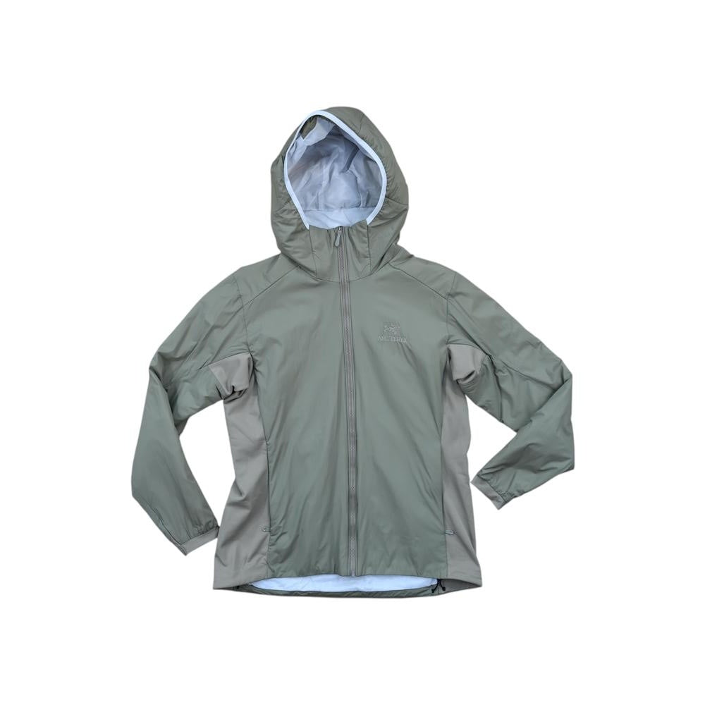 Tan women's hooded jacket by Arcteryx featuring tonal side panels.