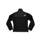 Black fleece jacket by North Face, with a smooth black panel across the upper chest and shoulders.