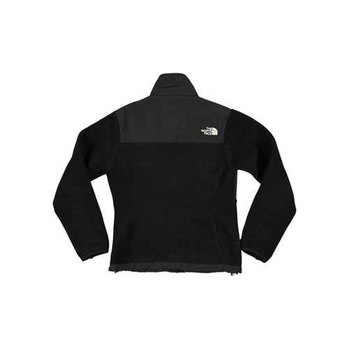 Black fleece jacket by North Face, with a smooth black panel across the upper chest and shoulders.