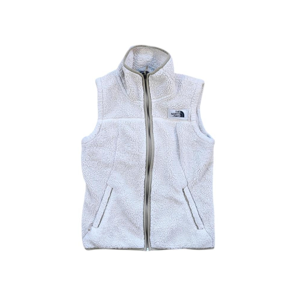 White fleece vest by North Face, featuring zip front and fleece texture.