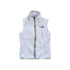 White fleece vest by North Face, featuring zip front and fleece texture.