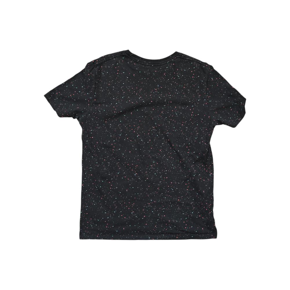 Black T-shirt by Topo Designs with a colorful cosmos pattern.