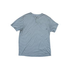 Blue henley shirt by Freefly with short sleeves and horizontal stripes, featuring a chest pocket.