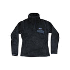 Black fleece pullover jacket by Patagonia with a snap closure and chest pocket.