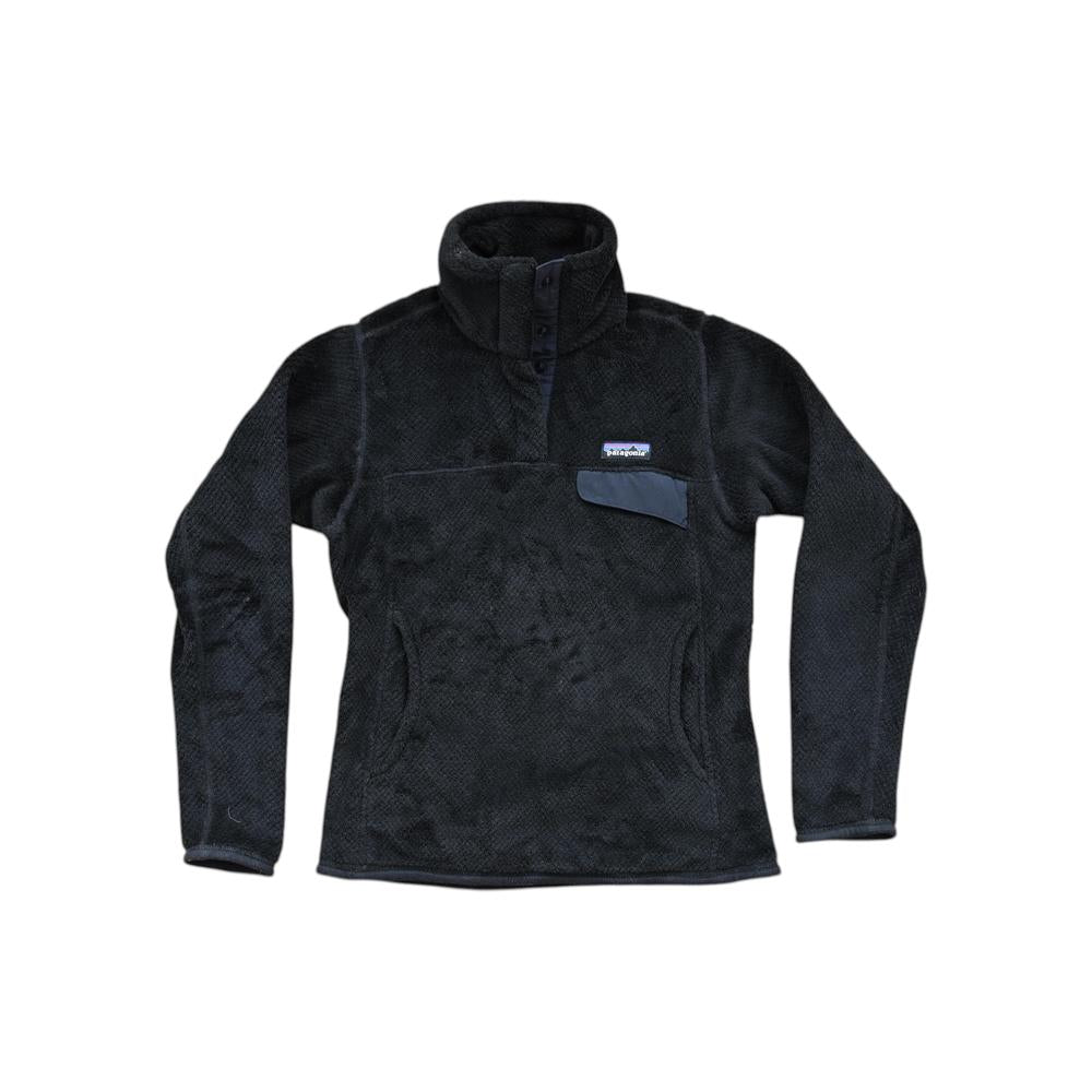 Black fleece pullover jacket by Patagonia with a snap closure and chest pocket.