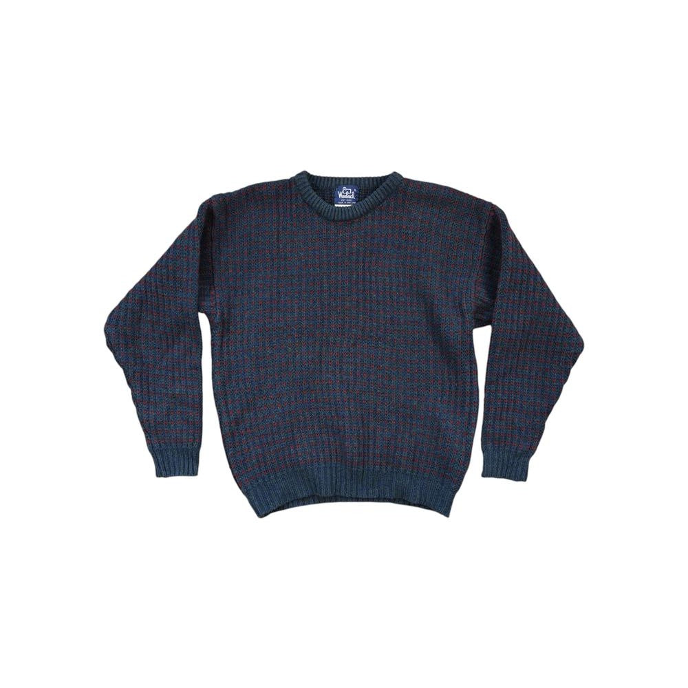 Navy and red wool sweater by Woolrich, with long sleeves and ribbed texture.