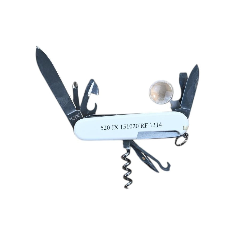 White Swiss Army multi-tool by Victorinox with exposed blades, corkscrew, and magnifying glass.