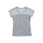 Gray organic cotton shirt by Patagonia, featuring an all-over logo print pattern.