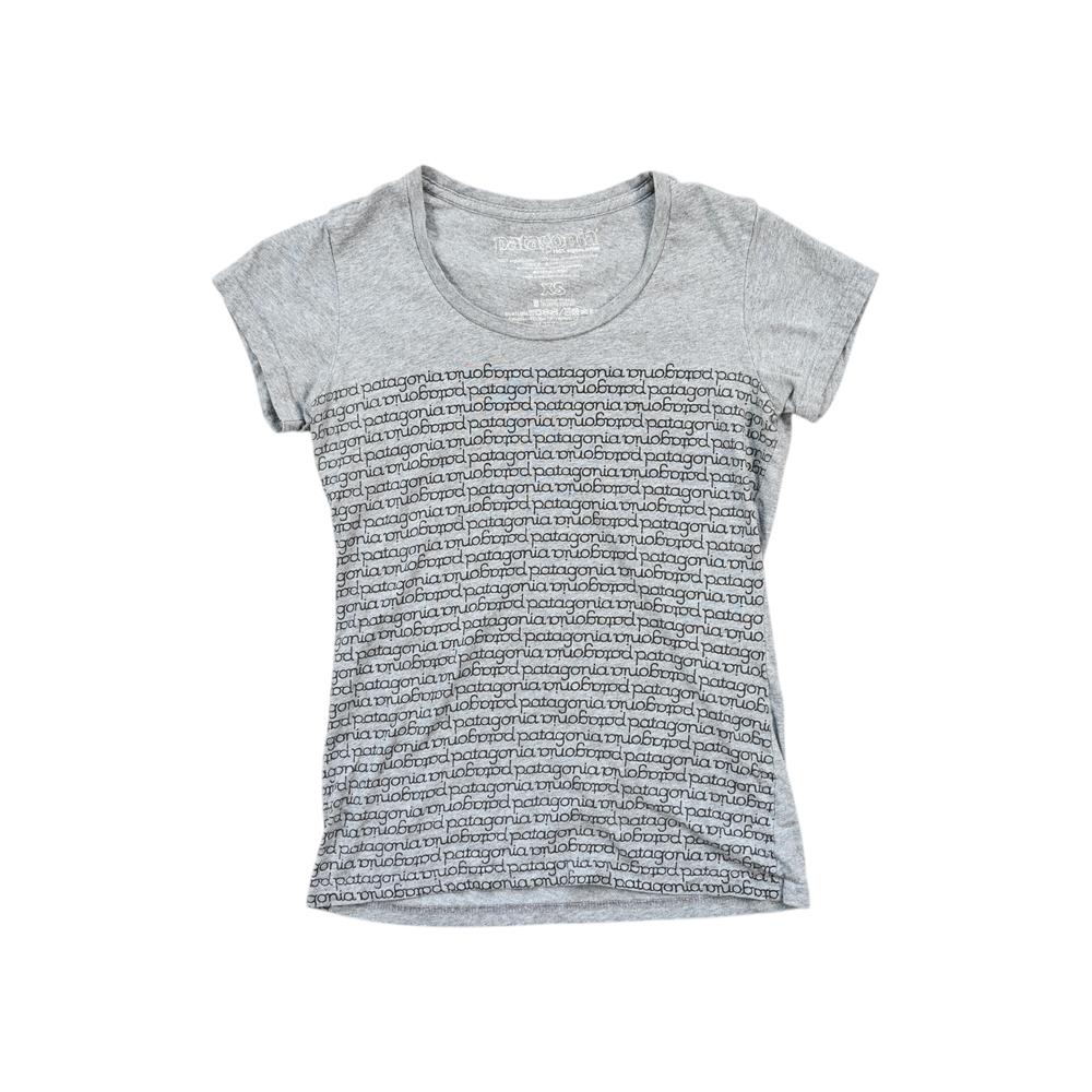 Gray organic cotton shirt by Patagonia, featuring an all-over logo print pattern.