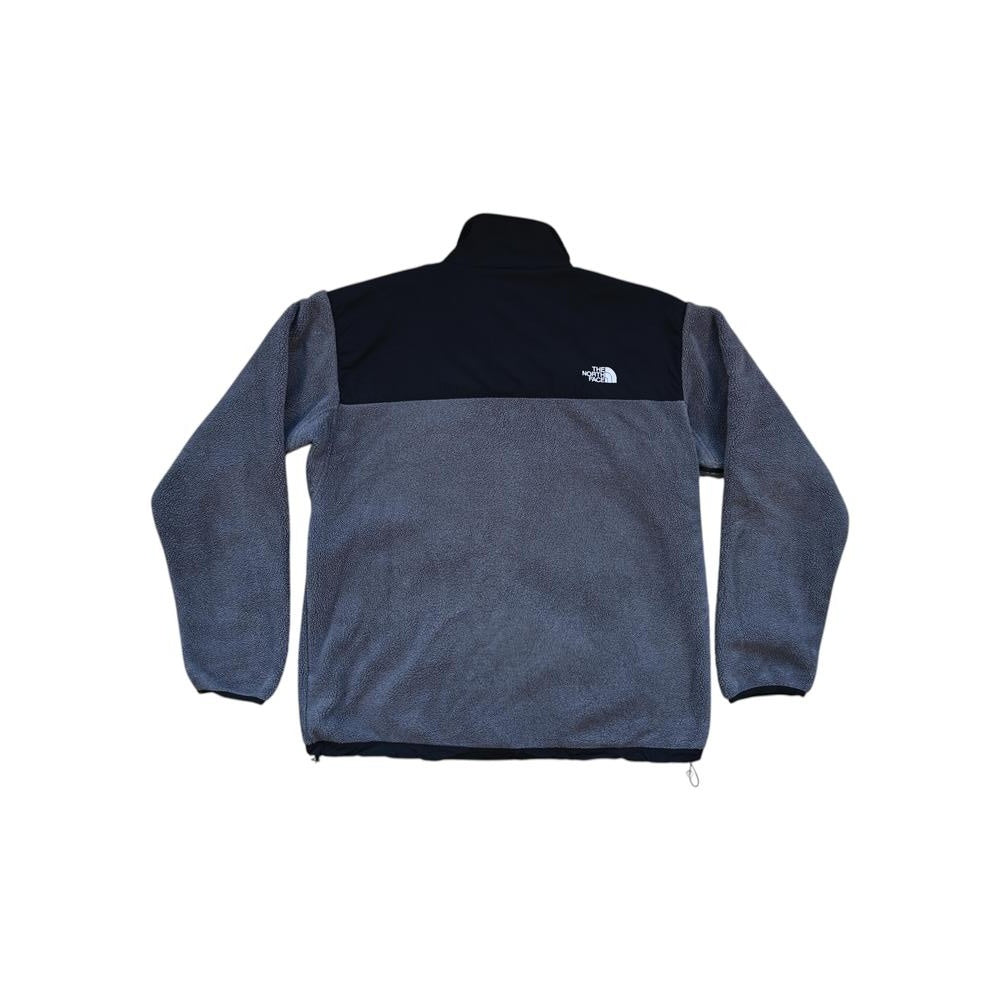 Fleece jacket in gray and black by North Face with long sleeves.