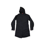 Black rain shell jacket by Topo Designs, featuring a hood and red detail on the sleeves and back.