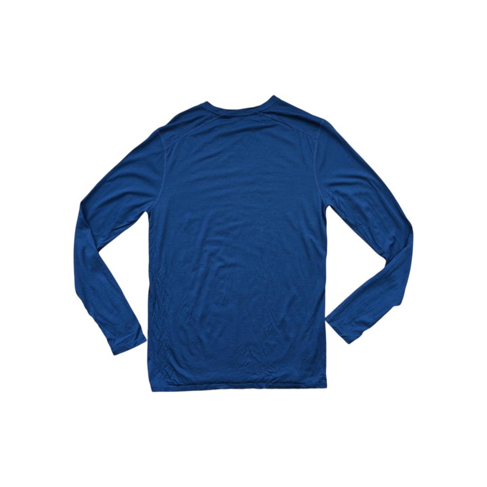 Blue merino baselayer shirt by Smartwool, shown from the back with long sleeves.