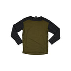 Green and black long-sleeve baselayer shirt by Flylow, shown on a white background.