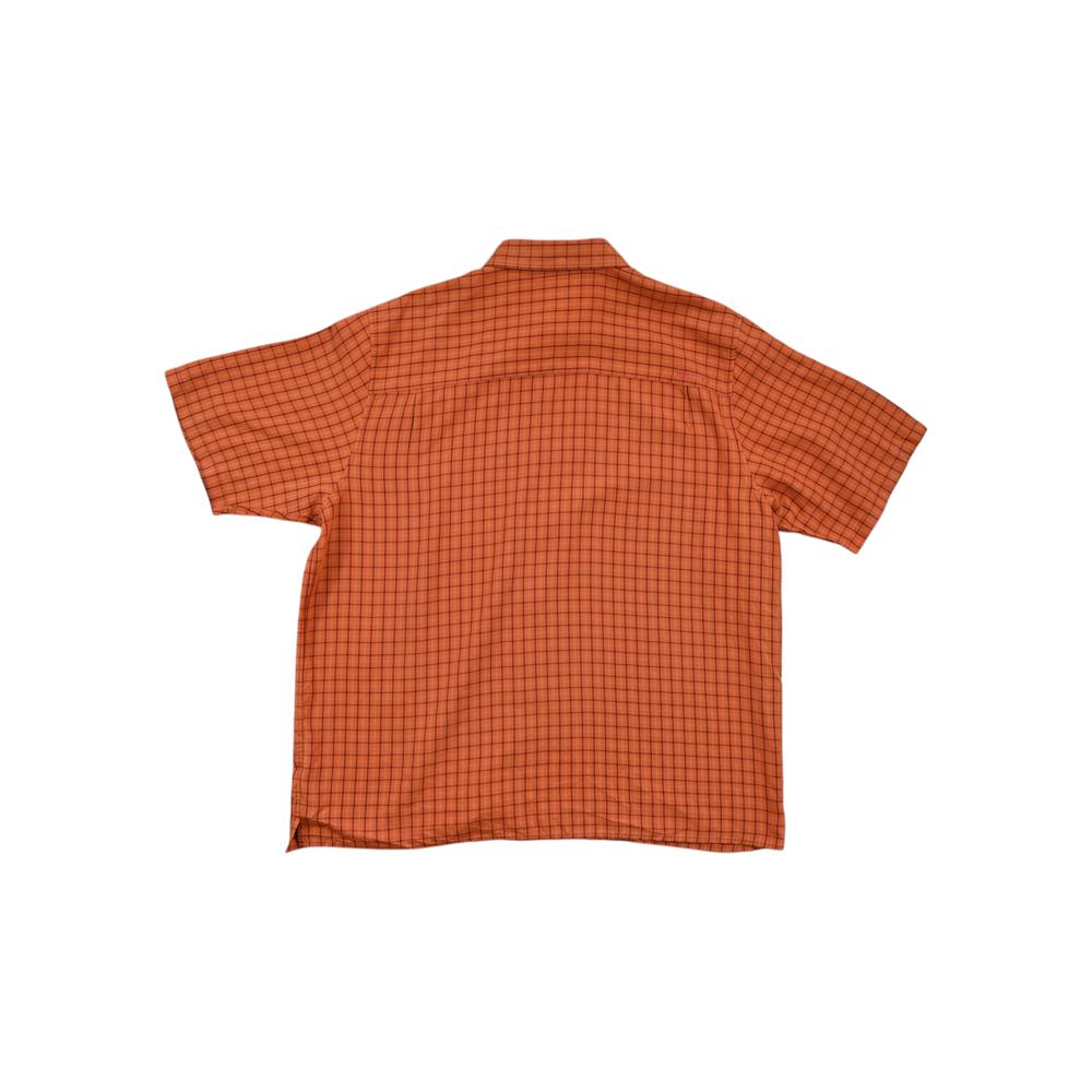 Orange button up shirt by Marmot, featuring a grid pattern, short sleeves, and a collar, shown from the back.