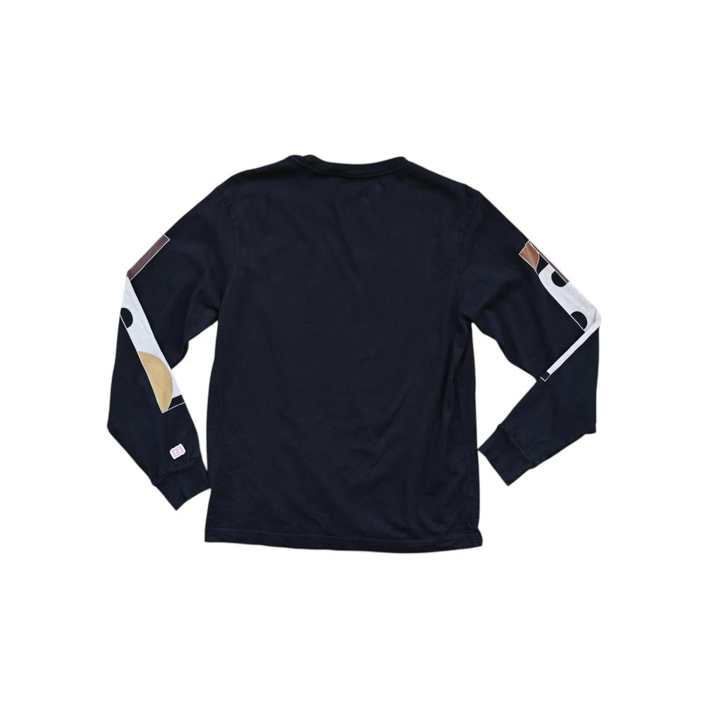 Black cotton long sleeve shirt by Topo Designs with geometric patterns on the sleeves.