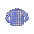 Blue flannel shirt by Patagonia in a plaid pattern with long sleeves.
