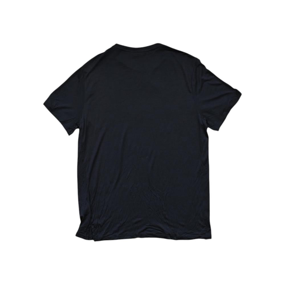Black merino shirt by Icebreaker, shown from the back with short sleeves and a crew neck.