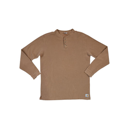 Tan henley thermal baselayer shirt by Carhartt with a three-button placket and long sleeves.