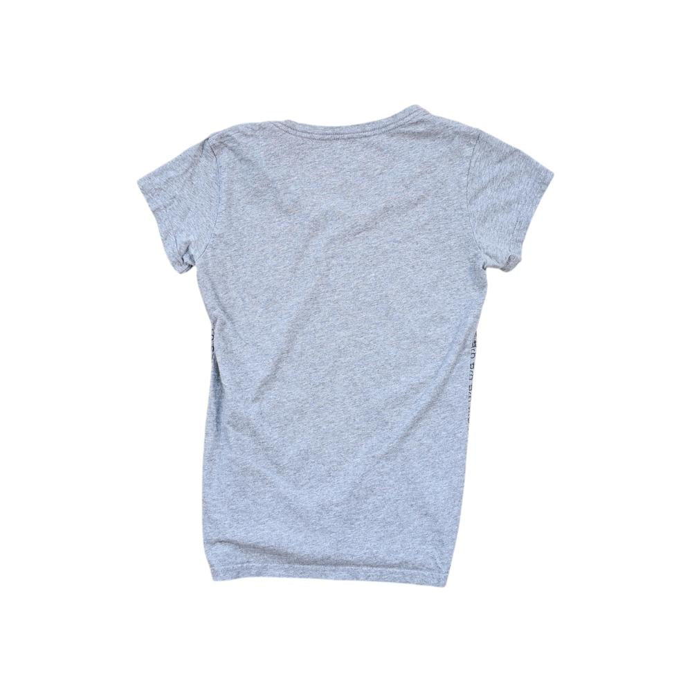 Grey organic cotton shirt by Patagonia, shown in a back view.